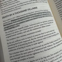 Customer-uploaded image. Click to see more details. The image represents: An open book showing a page with the heading "DEATH BY A THOUSAND VILLAINS" and several paragraphs of text discussing topics related to conflict and human behavior.